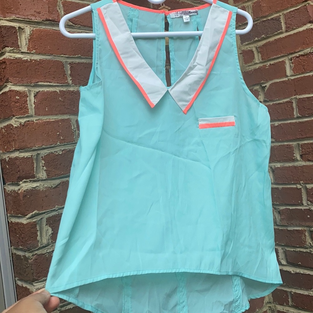 Namu sleeveless High Low Top. New never Used.